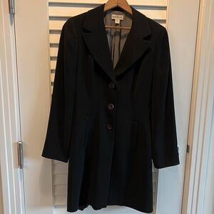 Black gabardine, long blazer three button front two slit pockets